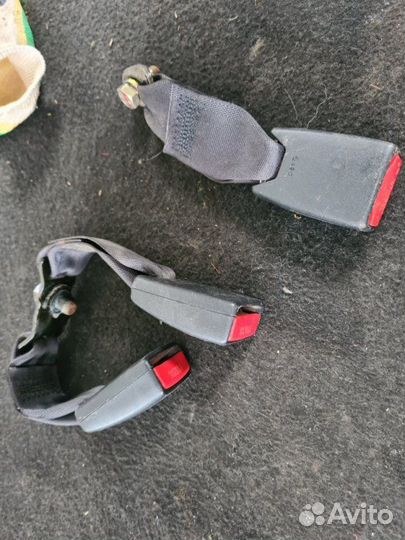 Замок ремня безопасности задний Mitsubishi Lancer