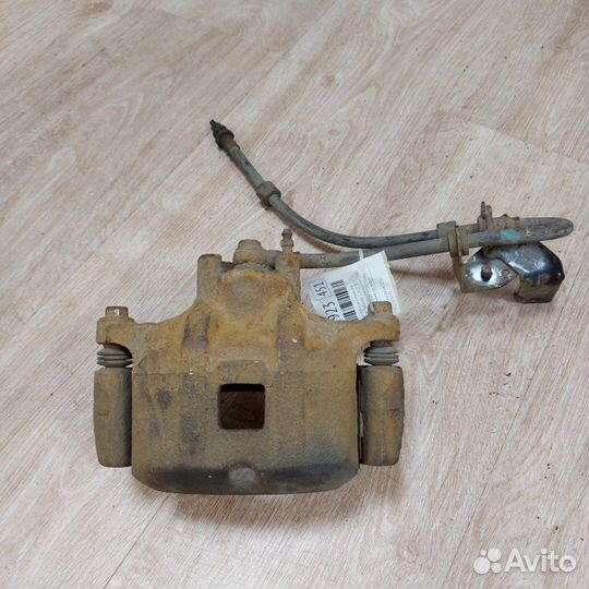 Суппорт тормозной передний левый Mitsubishi