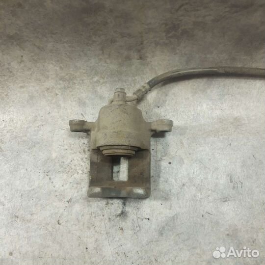 Суппорт тормозной Задний левый Ниссан Мурано Z50