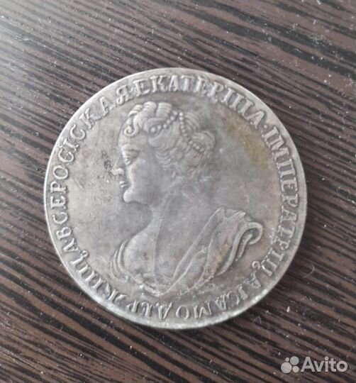 Серебряная монета царская 1725