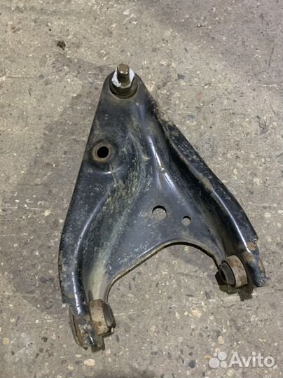 Рычаг подвески левый logan largus