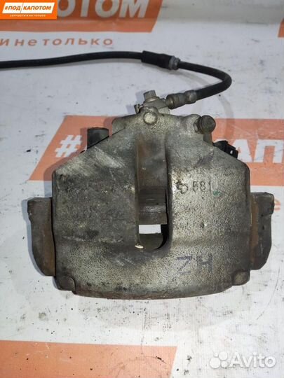 Суппорт тормозной передний левый Volkswagen Polo 5