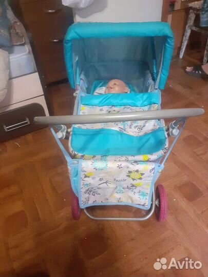 Игрушечная коляска для кукол