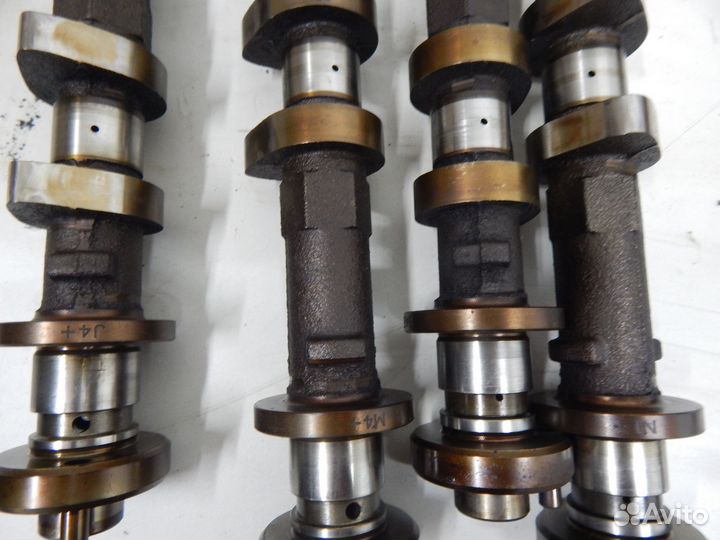 Распредвал Nissan VQ20