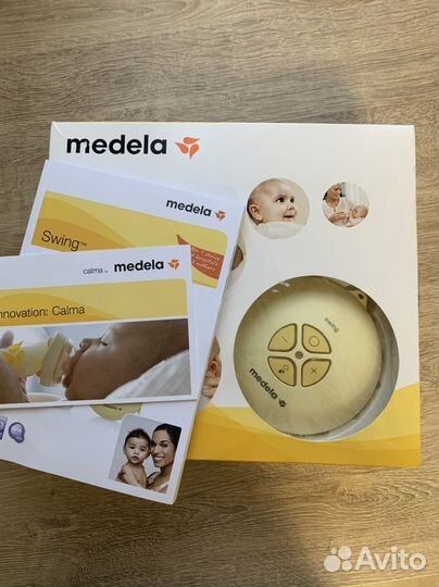 Молокоотсос medela свинг электрический