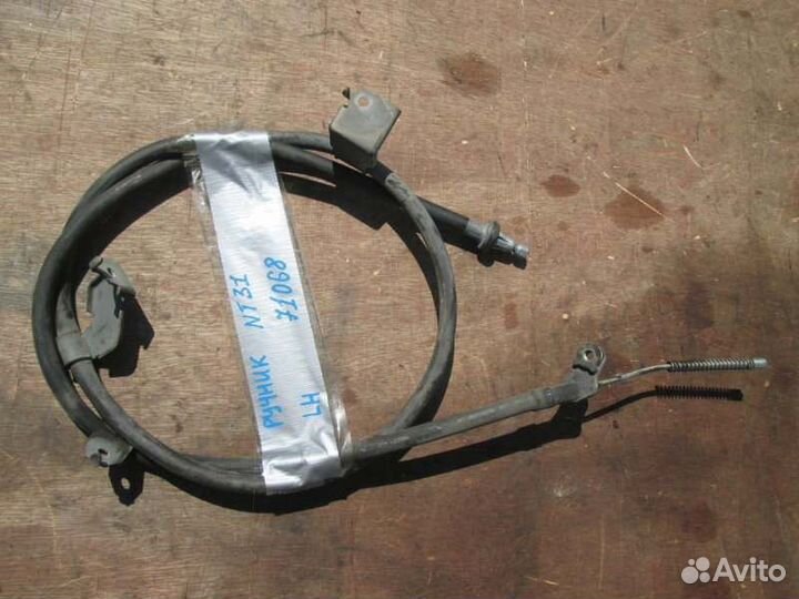 Трос ручника левый Nissan Xtrail NT31 MR20DE