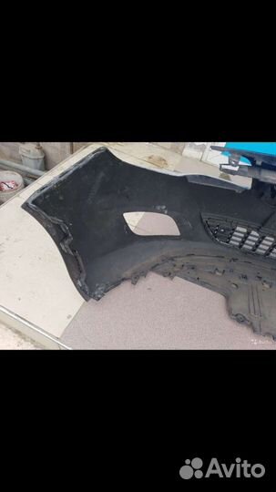 Передний бампер Opel Astra-J