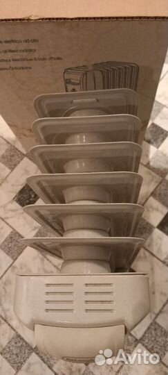 Масляный обогреватель delonghi