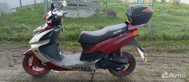 Скутер Omaks