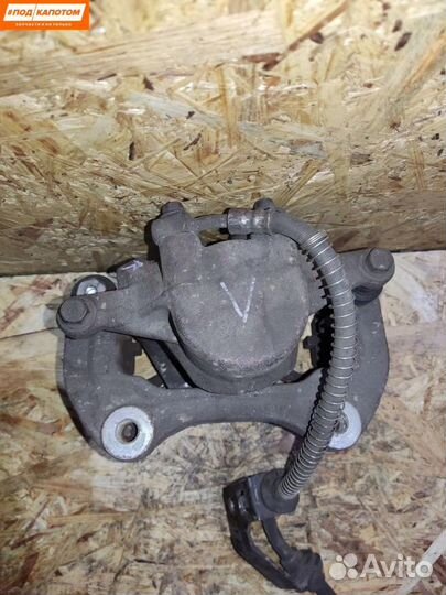 Суппорт тормозной передний правый Opel Astra J