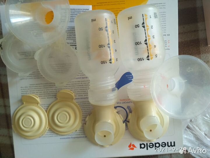 Молокоотсос medela swing maxi