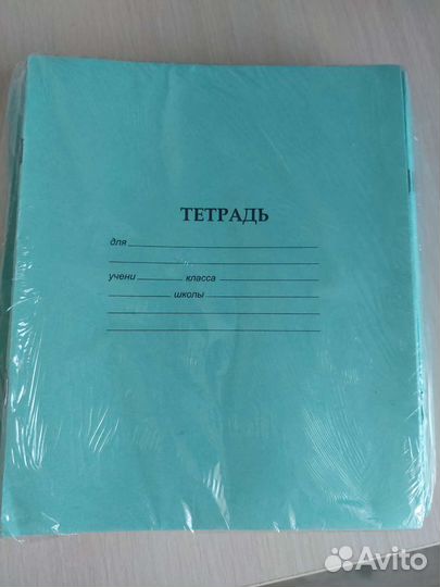 Тетради в клетку и косую линию