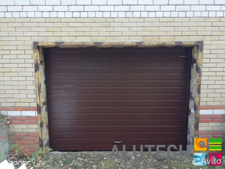 Секционные ворота для гаража alutech