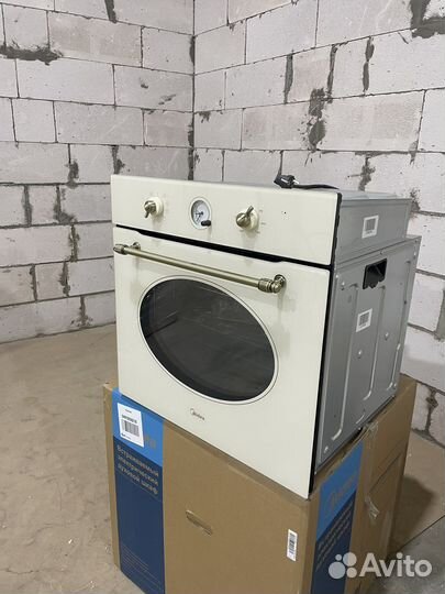Новый духовой шкаф Midea