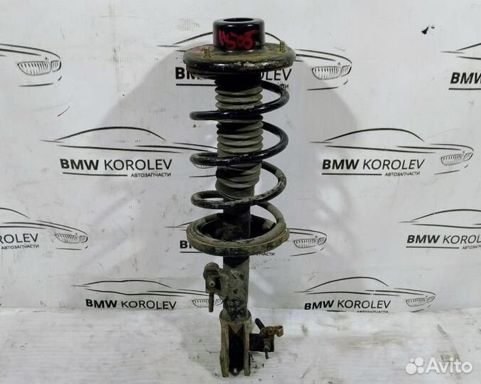 Амортизатор левый задний Suzuki Liana