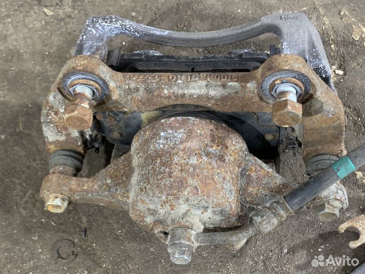 Суппорт передний левый KIA K5 DL3