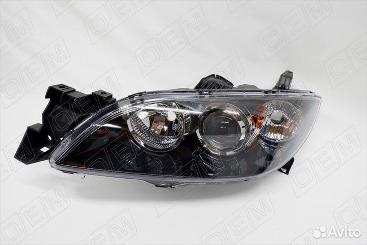 Фара левая Mazda 3 1 вк 2003-2009