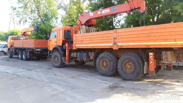 Аренда и услуги манипулятора-вездехода, стрела 7 т, 20 м, борт 12 т, 6.2 м