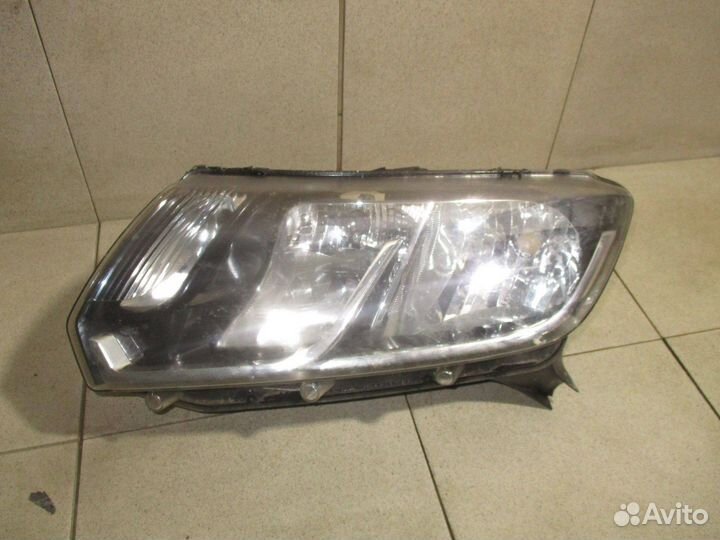 Стекло фары левой Renault Logan 2