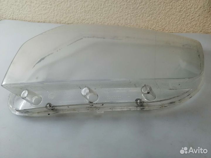 Стекло фары левой Renault Duster