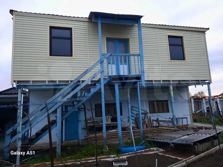 Дом 56 м² на участке 5 сот.