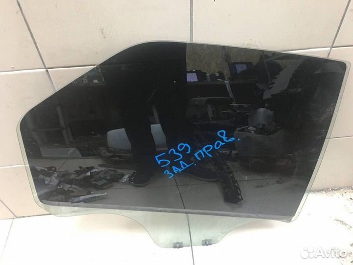 Стекло задней правой двери Renault Logan