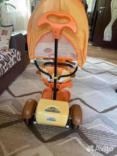 Трёхколёсный велосипед с родительской ручкой