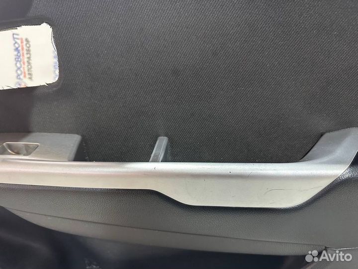 Обшивка двери Kia Rio 3