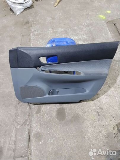 Обшивка двери mazda 6 gg