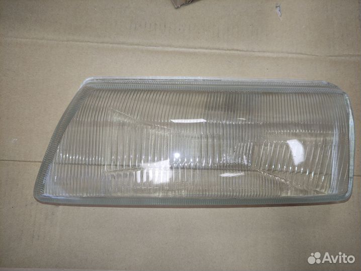 Стекло фары левое Opel Vectra 93-96
