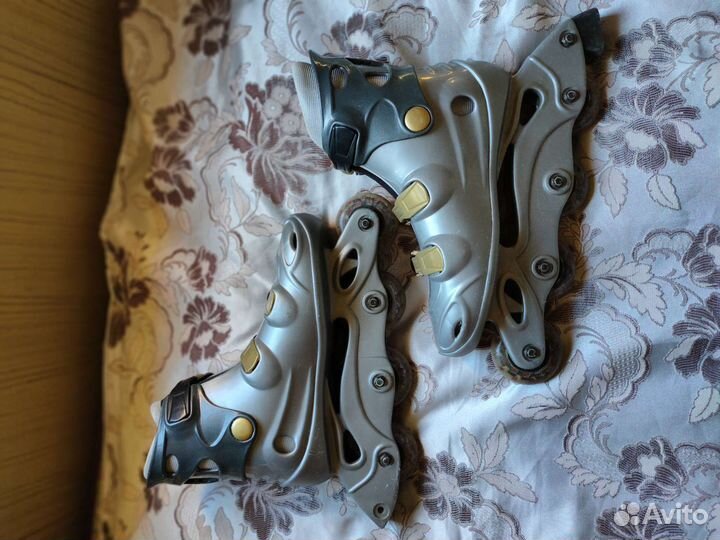 Роликовые коньки