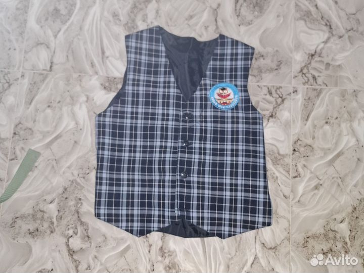 Школьный жилетка