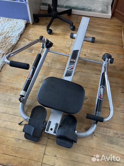 Гребной тренажер