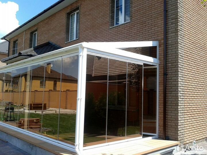 Безрамное раздвижное остекление