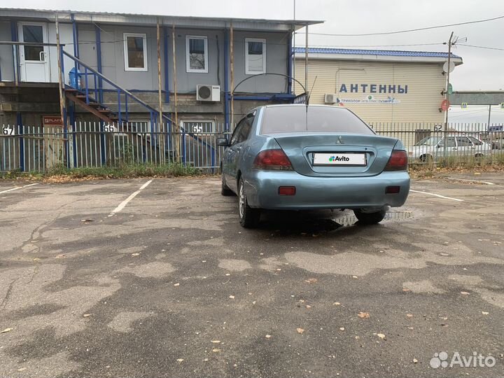 Mitsubishi Lancer 1.3 МТ, 2006, 402 610 км