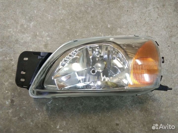 Фара левая Форд Фиеста MK 4 рестайлинг