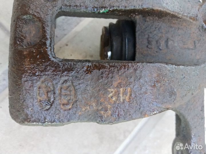 Суппорт задний левый Киа Рио 3