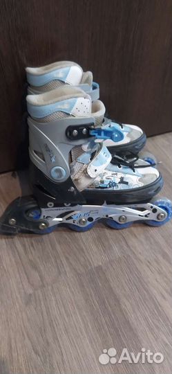 Роликовые коньки