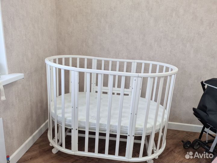 Кроватка трансформер с маятником