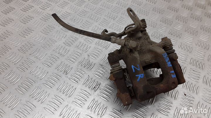 Суппорт тормозной задний правый Skoda Octavia A5