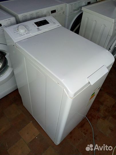 Стиральная машина с вертикальной загрузкой