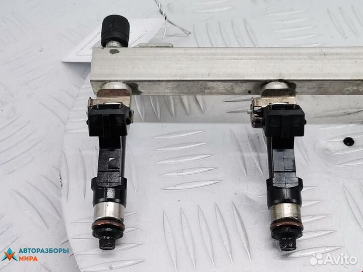 Форсунка Opel Corsa D рест. 2011 24420543