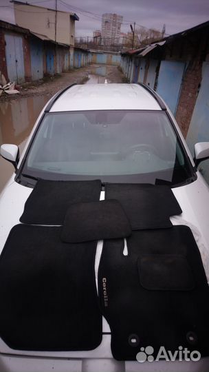 Автомобильные коврики текстильные на Toyota Coroll