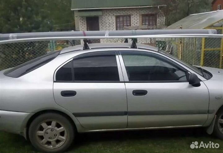Багажник на крышу Mitsubishi Carisma