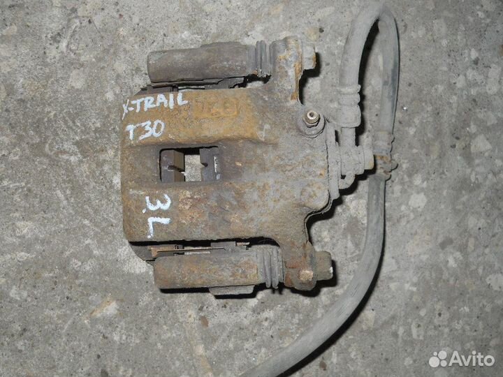 T30 Суппорт тормозной задний левый Nissan