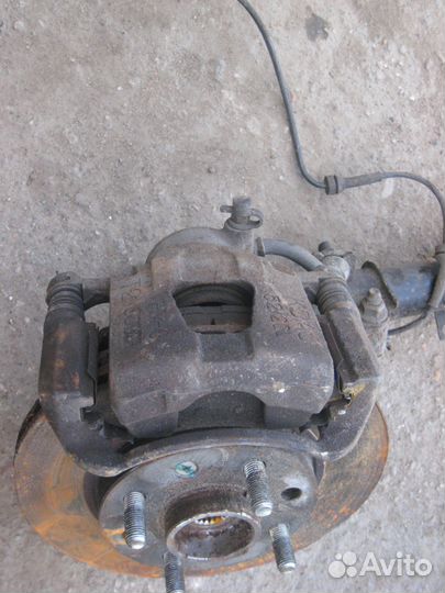 Суппорт тормозной передний Шевроле Авео Т250