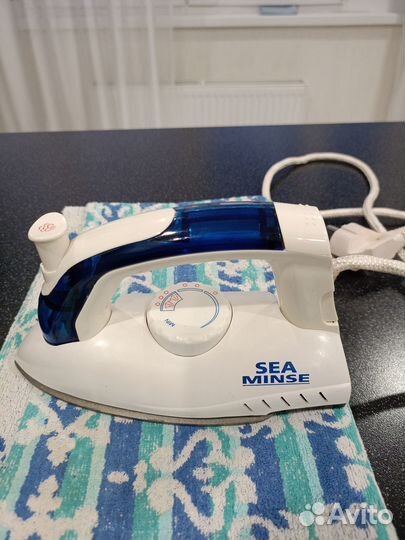 Дорожный утюжок со складной ручкой