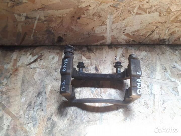 Скоба суппорта переднего Opel Meriva A 2003-2010