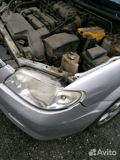 Фара мазда 323f