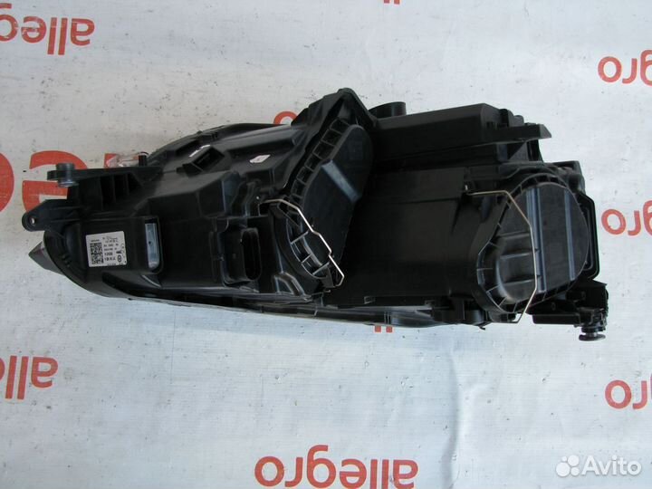 Фара передняя левая VW Golf Sportsvan 2013+